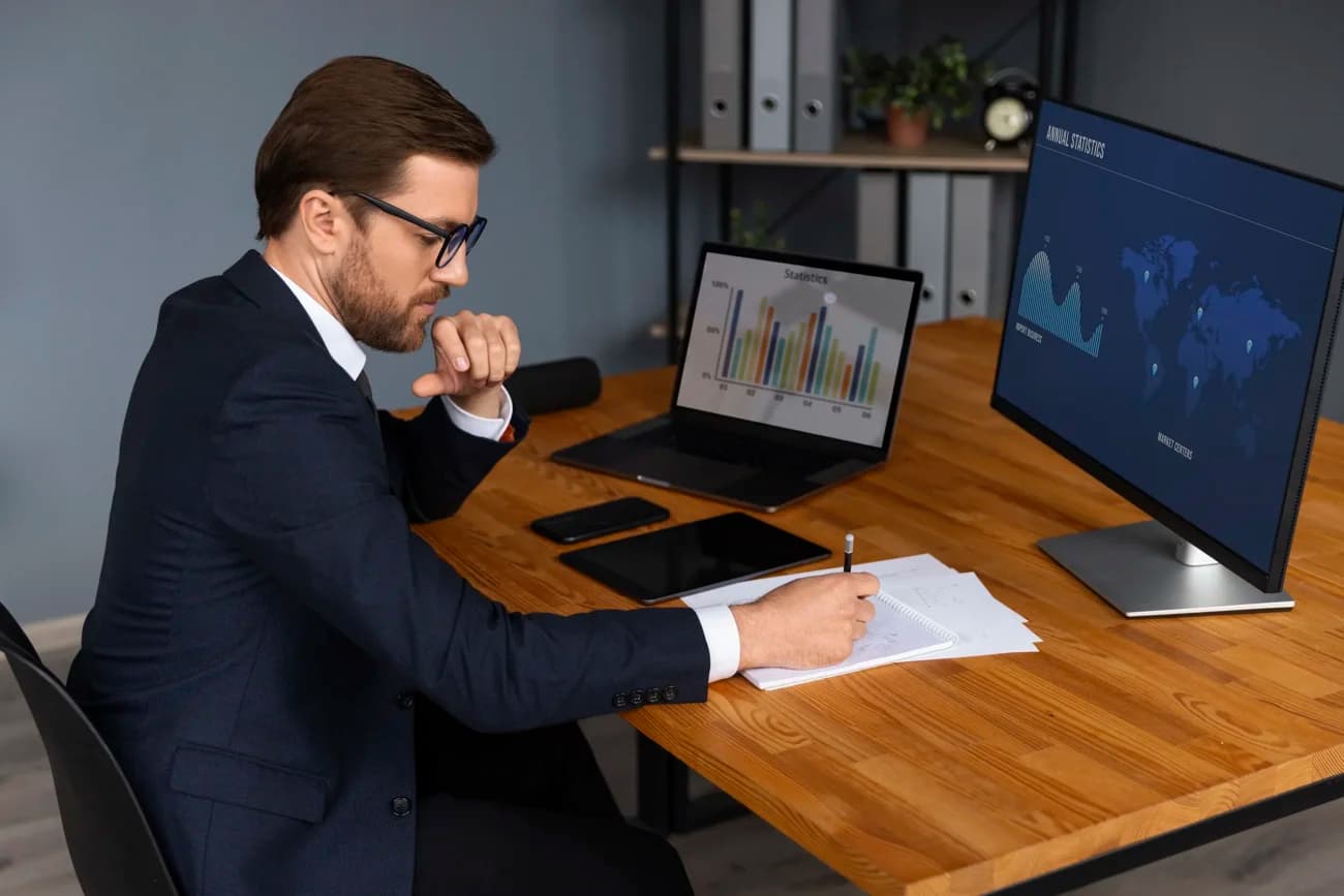 Financial advisor reviewing September 2026 market data charts