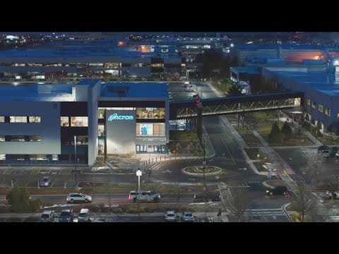 Micron Technology campus buildings illuminated at night