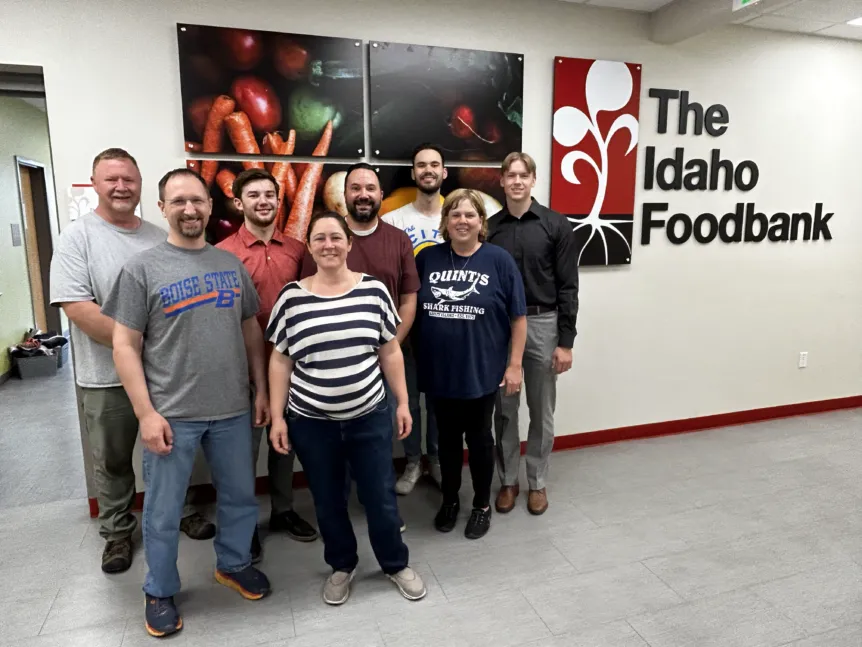 Treasure Valley Financial Planning team volunteering at The Idaho Foodbank to support local community.