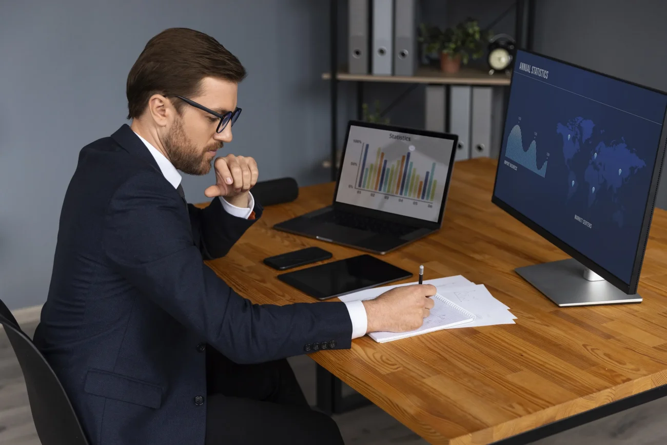 Financial advisor reviewing June 2026 market update charts at desk in Meridian Idaho Treasure Valley